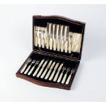 A part cased set of silver fruit knives and forks, Cooper Brothers & Sons Ltd, Sheffield 1929,
