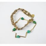 A turquoise set yellow metal bracelet, stamped '750',