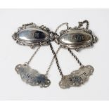 A pair of Victorian silver decanter labels, Nathaniel Mills, Birmingham 1852,