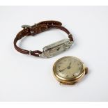 A lady's Art Deco diamond set wristwatch, with brown leather strap,