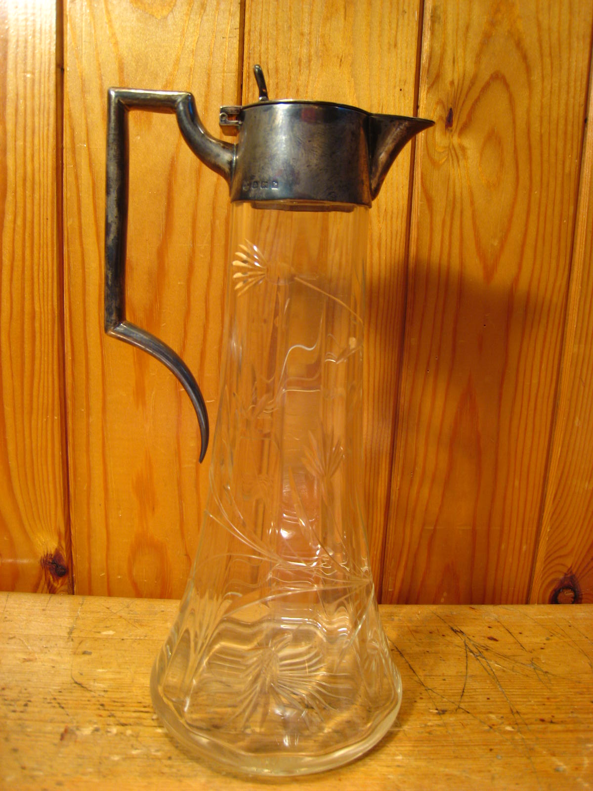 A sterling silver mounted claret jug, the broad star cut base rising to a cylindrical body and - Image 5 of 7