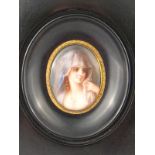 A hand painted portrait miniature on por