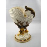 A Royal Worcester nautilus shell vase on