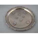 A small Chinese silver salver with stiff