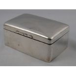 A sterling silver cigarette box by Walke