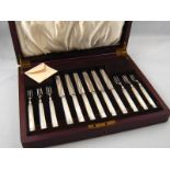 A cased set of six sterling silver pairs