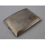 A sterling silver cigarette case with en