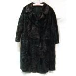 A black and mahogany long fur coat, prob