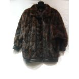 A short mink jacket, 72 cm long.