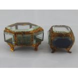 Two French gilt metal mounted display bo