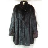 A three quarter length mink fur cote siz