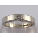 A platinum and diamond solitaire ring, t