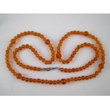 An amber bead necklace, largest bead app