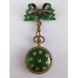 A green enamel and seed pearl fob watch