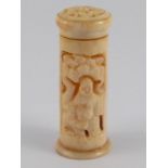 A turned and carved pierced ivory cylindrical container. 7.5cm. long, circa 1920.