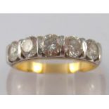 A yellow metal (tests 18 carat gold) five stone diamond ring,