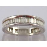 A 14ct white gold diamond eternity ring  the baguette cut diamonds measuring approx 2.4mm x 1.