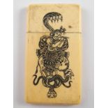 A Chinese ivory card case engraved and filled with figures and snakes. 8.5x4.5cm, circa 1900.