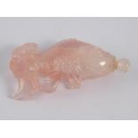 A Chinese quartz snuff bottle and stopper, well carved as a carp. Ht.7cm.