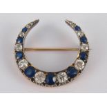A fine Victorian sapphire and diamond crescent brooch,