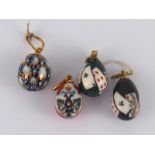 Four Russian enamelled eggs, all maker's mark only.