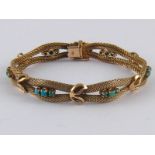 An antique 18 carat gold turquoise rope bracelet, unascribed continental marks, approx 18cm long,