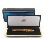 A Mont Blanc gold plated on sterling silver fountain pen with 18ct. nib. in presentation case.