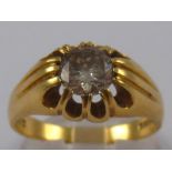 An 18 carat gold gent's diamond solitaire ring, the round brilliant cut diamond measuring approx 7.