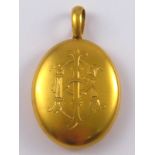 A Victorian 15ct. oval locket in original shaped case, circa 1880. 3.8x5.8cm. plus loop.