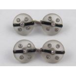 A fine pair of rock crystal, diamond and black enamel cufflinks, each side approx. 13.