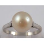 A French hallmarked platinum cultured pearl ring, pearl approx 8mm diameter, ring size L, 2.1 gms.