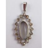 A white metal (tests silver) moonstone and diamond pendant, approx 3.5cm drop.