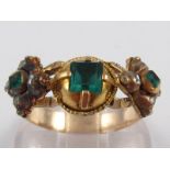 A yellow metal (tests 15 carat gold) emerald and rose cut diamond ring,