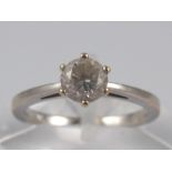 An 18 carat gold diamond solitaire ring,