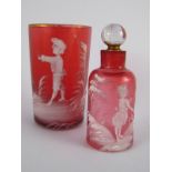 Two pieces of cranberry glass with "Mary Gregory" white enamel scenes,