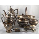 A comprehensive Russian silver tea equipage, comprising a seven piece tea set,