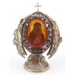 A turned wooden Easter egg, painted with Virgin and Child,