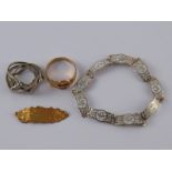 A mixed lot comprising a 9 carat gold buckle ring, size V, 3.