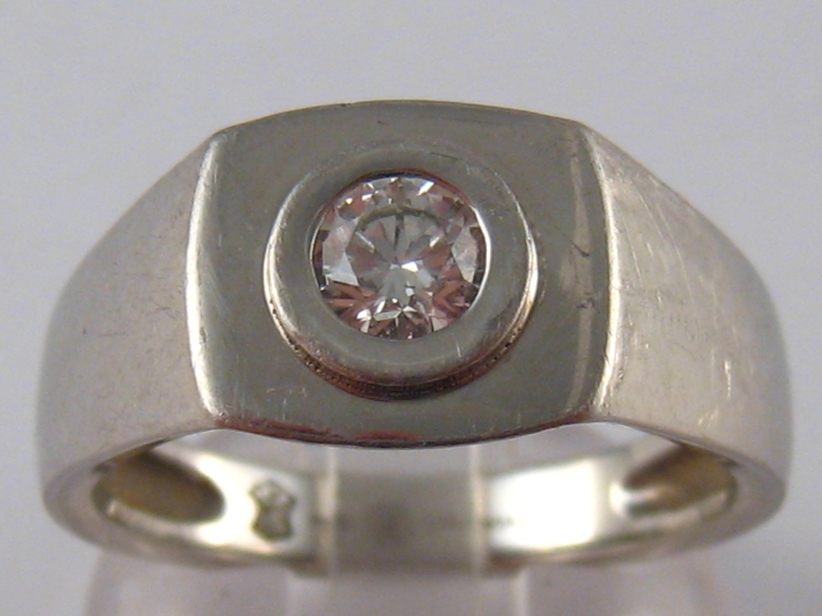 A French hallmarked platinum diamond solitaire ring, numbered 1FR14345A1,