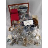 A large quantity of costume jewellery and a jewellery box.