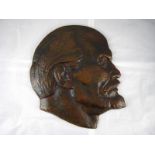 A cast bronze plaque of Lenin. Approx 32x33cm.
