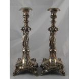 A pair of tall Austro Hungarian silver, 800 grade, caryatid figural candlesticks,