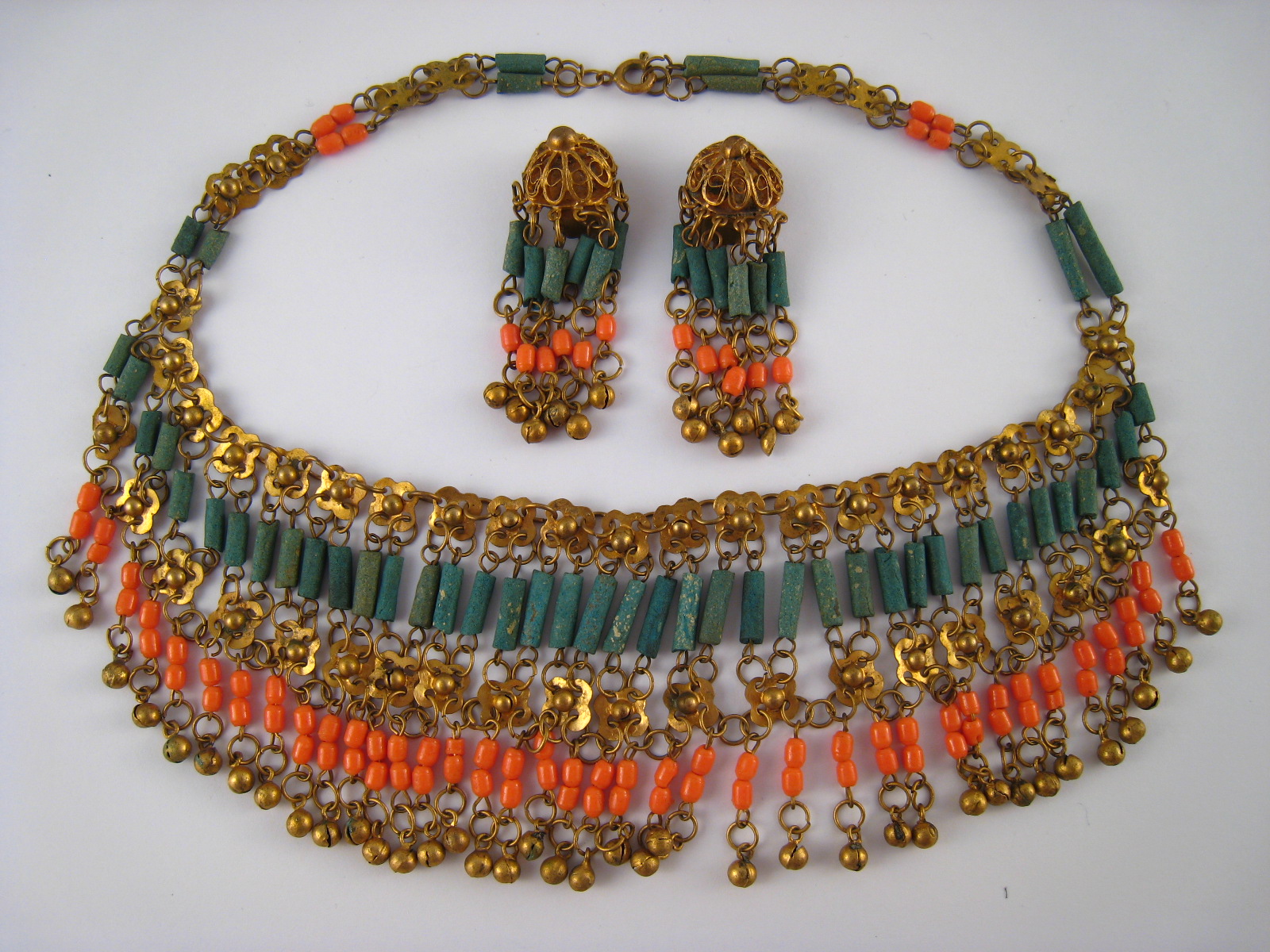 A 1920's - 30's Austrian gilt metal and ceramic fringe necklace with matching clip earrings,