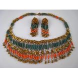 A 1920's - 30's Austrian gilt metal and ceramic fringe necklace with matching clip earrings,
