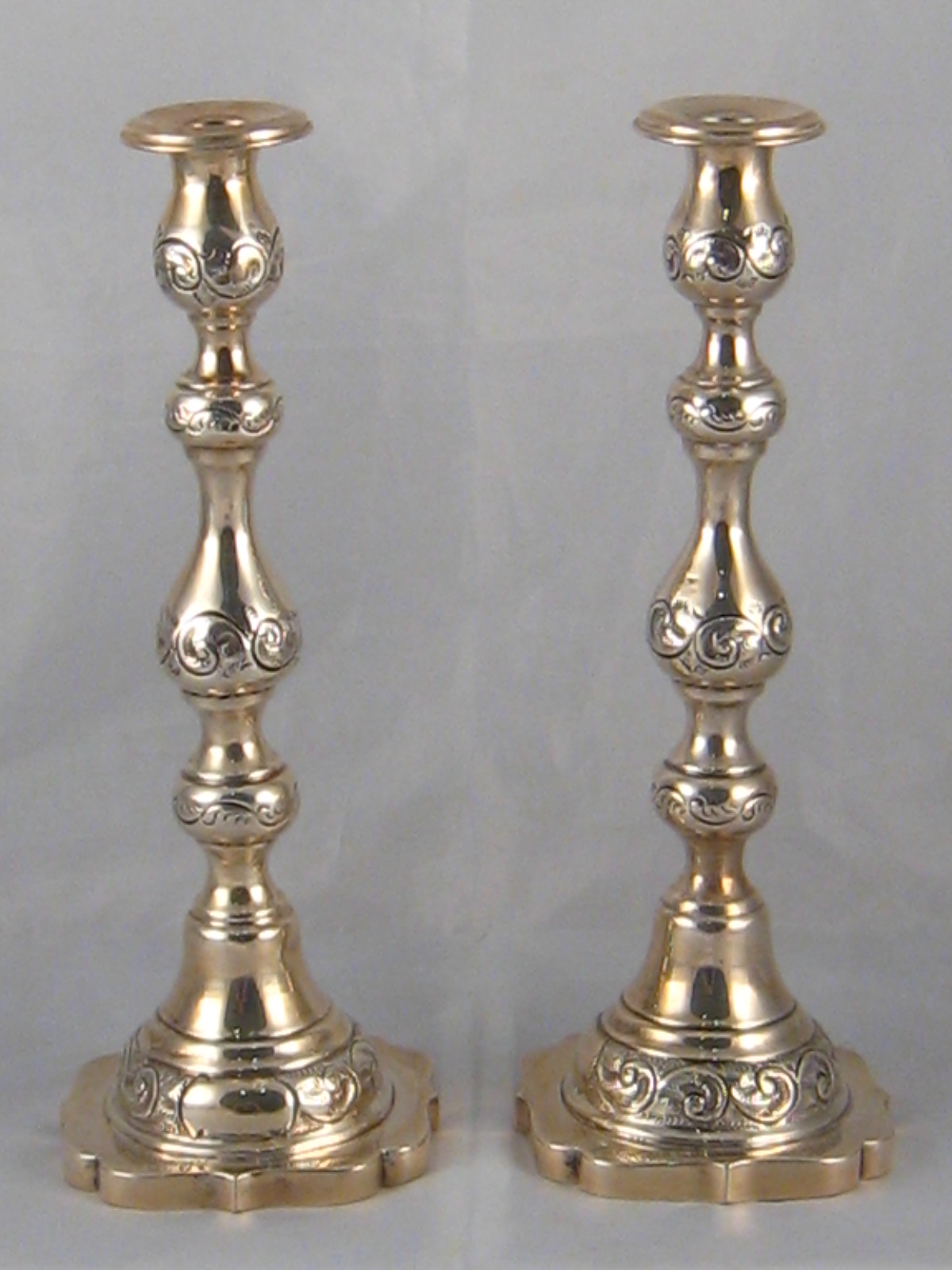 A pair of silver Shabat candlesticks with sconces by M.S, probably Morris Salkind, London 1923. Ht.