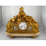 A large ormolu clock on marble base representing Diana the huntress and her hound resting,