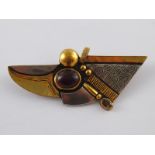 A gilt and white metal (tests silver) garnet brooch, signed HB, garnet approx 12 x 10mm,