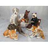 A group of eight Soviet ceramic animal figures by Lomonosov, comprising panda, rabbit,