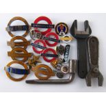 Railway memorabilia. London underground badges, carriage keys, and other badges.