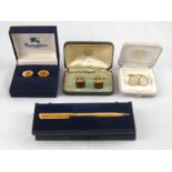 A mixed lot comprising a pair of Burberrys gilt cufflinks in original box,